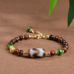 Handcrafted Tibetan Tiger Eye Dzi Bead and Rosewood Bracelet
