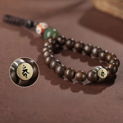 Porte-clés en jade Hetian naturel et bois d'agar de Brunei, orné d'un animal du zodiaque et d'un Bouddha gardien