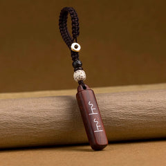 Glücksbringer aus schwarzem Ebenholz: Schlüsselanhänger & Handy-Anhänger