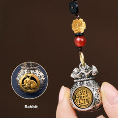 Drehen Sie am Glücksrad: 12 Sternzeichen-Schlüsselanhänger mit drehbaren Geldbeuteln