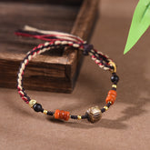 Pulsera tejida de inspiración tibetana: cordón hecho a mano de estilo étnico vintage