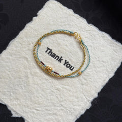 Pulsera de calabaza trenzada de doble capa | Cadena apilable con borlas, joyería artesanal