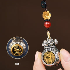 Drehen Sie am Glücksrad: 12 Sternzeichen-Schlüsselanhänger mit drehbaren Geldbeuteln