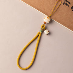 Bodhi Maneki Neko Charm : dragonne de téléphone et bracelet pour la bonne fortune