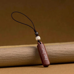 Glücksbringer aus schwarzem Ebenholz: Schlüsselanhänger &amp; Handy-Anhänger