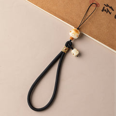 Bodhi Maneki Neko Charm : dragonne de téléphone et bracelet pour la bonne fortune